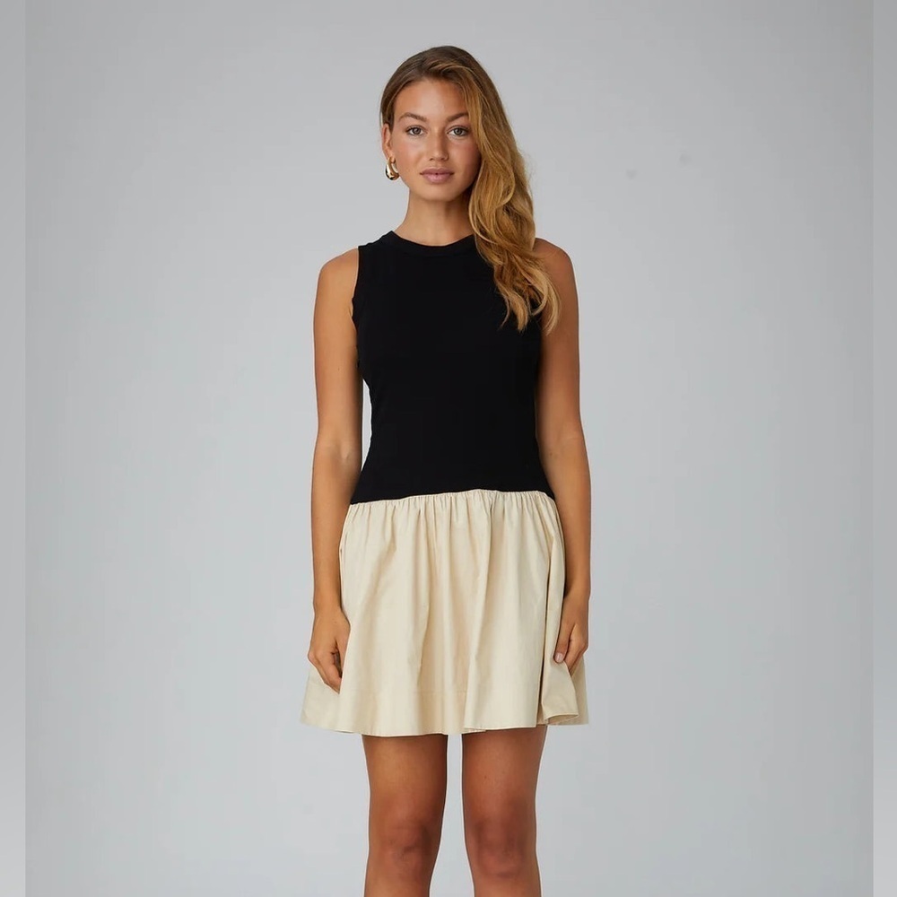 Drop hem ruffle mini dress camille ribbed poplin waist block bubble sleeveless